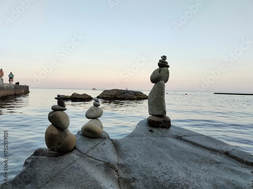 Wallpaper Mural pyramids of stones. stone pyramids on the seashore Torontodigital.ca