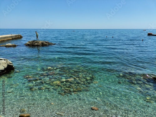 Wallpaper Mural beautiful seascape. calm weather, rocks, shore Torontodigital.ca