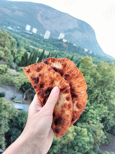 Wallpaper Mural homemade cakes. chebureks. background nature, mountains, forest Torontodigital.ca