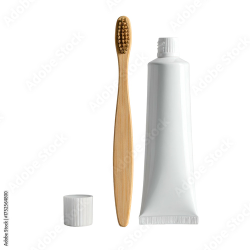 Bamboo toothbrush and blank toothpaste tube sit on black background.