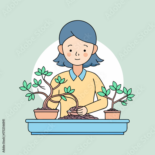 Woman tending to two small bonsai trees with care