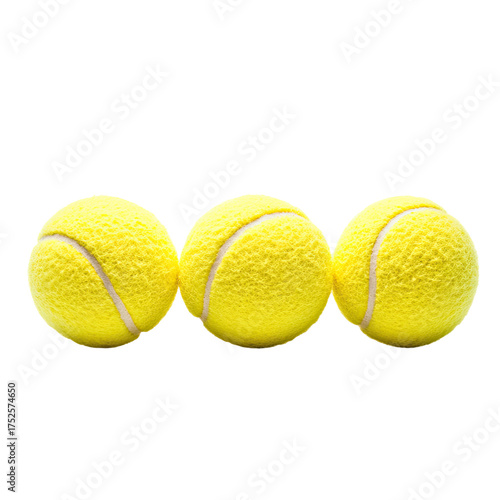 Three yellow tennis balls lined up on a black background