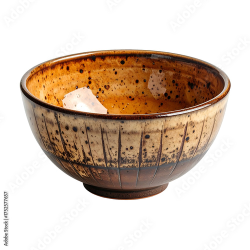 Rustic ceramic bowl features speckled glaze and incised lines.