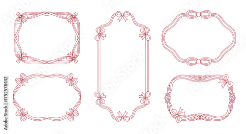 Collection of decorative ornate frames with floral and ribbon accents.