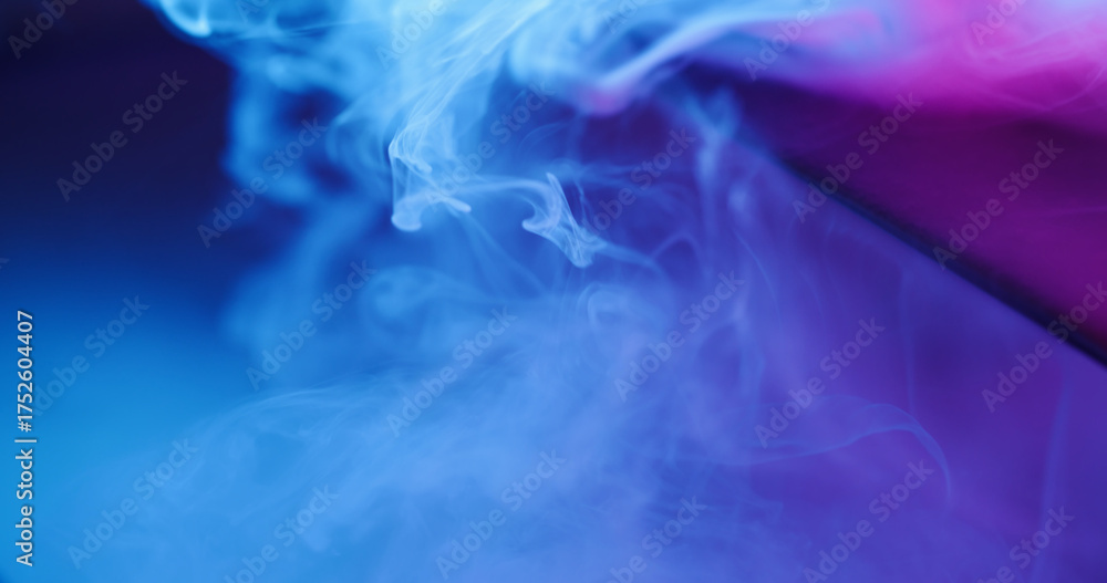 Fototapeta premium Fluorescent vapor. Smoke cloud. Blur blue purple neon color paint splash acrylic underwater glass texture spreading on abstract background.