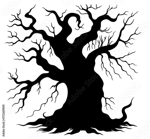 Old bare haunted tree with thick roots and tangled branches forming eerie shapes