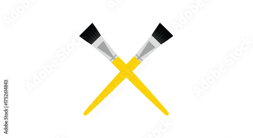 Crossed yellow paint brushes for art creation and creative expression.