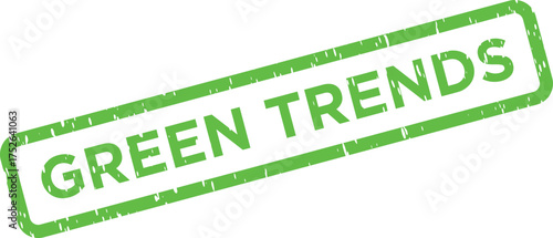 This vivid green grunge style rubber stamp with the prominent text GREEN TRENDS rests on a clean white backdrop