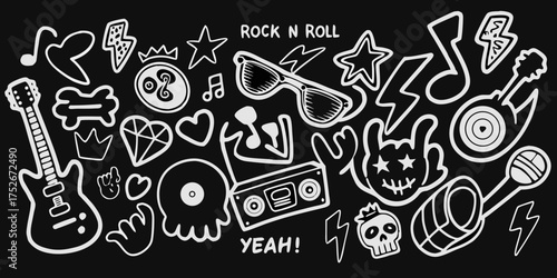 Hand drawn rock and roll icons and symbols in white on a black background