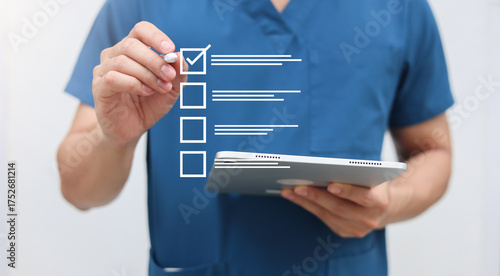 close up young general practitioner hand use stylus pen to check box on medical chekclist or opd record to read and diagnose and assess about patient's symptom for healthy and lifestyle concept