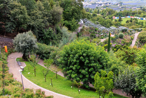 Gardens of Trauttmansdorff Castle panorama with flowers, trees and plants near Merano, South Tyrol, Italy