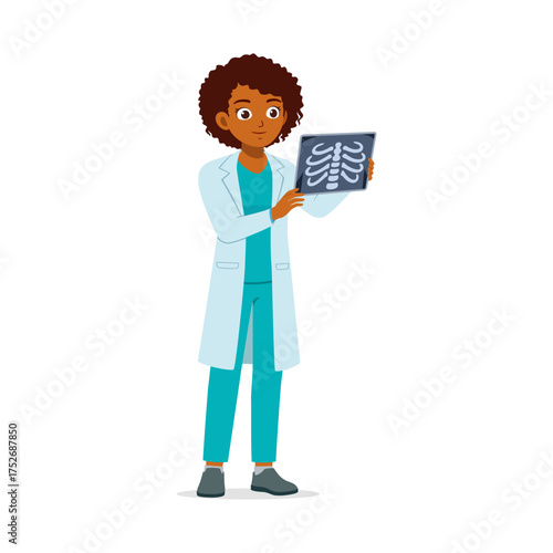 African American female doctor examining xray image in hospital with lab coat uniform