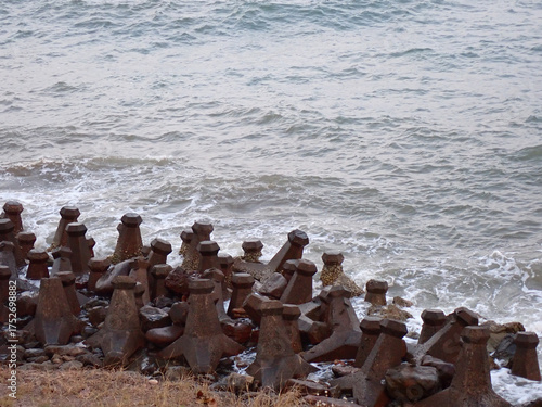 Coastal defenses tetrapods, breakwater concrete structures, wave breakers, shoreline protection

