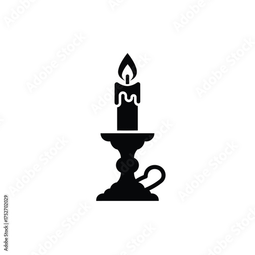 Classic elegance a lit candle in an ornate candlestick symbolizing light warmth and ambiance silhouette