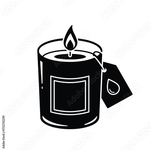 Burning scented candle in glass jar with tag flame wax aroma ambiance silhouette
