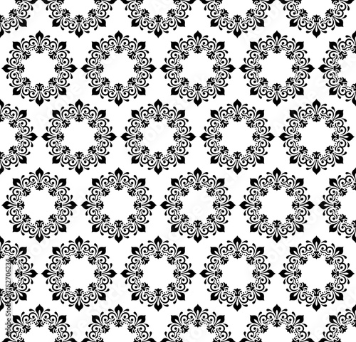 Oriental vector black ornament with arabesques and floral elements. Traditional classic ornament. Vintage pattern with arabesques