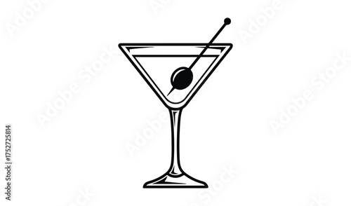 Classic martini cocktail with olive and garnish in a stemmed glass