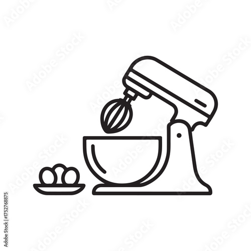Stand mixer with eggs ready for baking and cooking