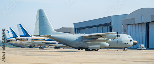 Military transport aircraft parked at the airport