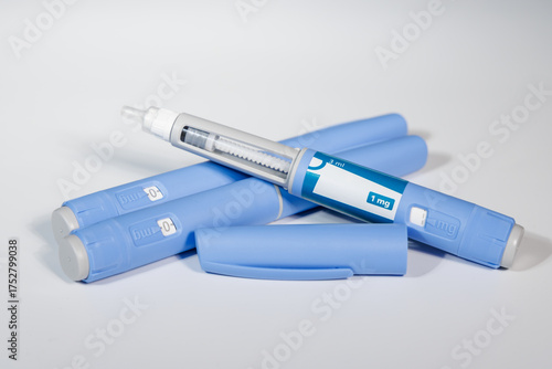 Flat lay with semaglutide pens and medical accessories for diabetes healthcare theme