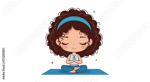 A young girl with curly brown hair meditates peacefully on a blue yoga mat.