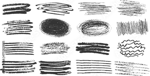 Collection of black scribbled strokes and textured shapes on a white background