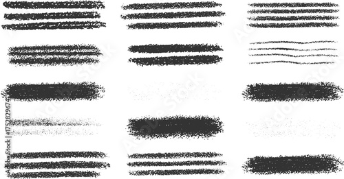 A collection of dark textured brush strokes and lines on a white background.