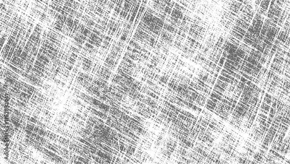Fototapeta premium A monochromatic texture of gray and white crisscrossing lines and marks creating a distressed surface.