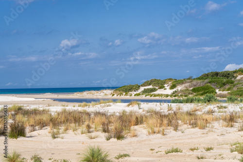 Coastal landscape of Cap Bon, Tunisia, showing Oued Labib flowing toward the sea under soft natural light.