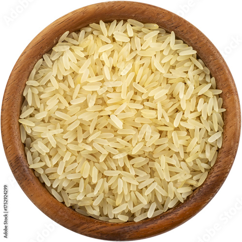 Konstfotografi Parboiled rice in wooden bowl isolated, top view