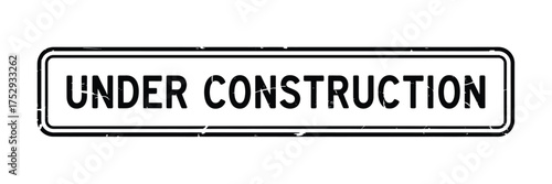Black and white sign indicating road construction ahead