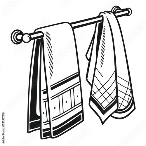 Two neatly arranged decorative towels hang over a metal rod in black and white