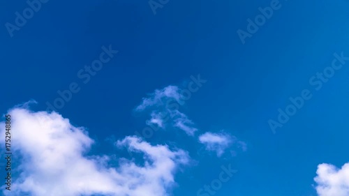 Blue Sky Timelapse with White Clouds on Light Blue Background – Tranquil Nature 4K Video