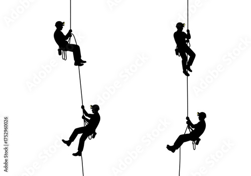Silhouettes of four people rappelling down ropes, wearing harnesses and helmets, in a climbing or descending activity.