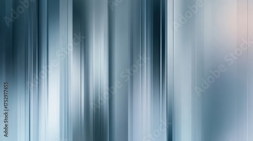 Abstract blurred background with vertical lines in shades of blue, creating a serene and modern atmosphere