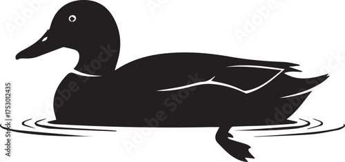 Silhouette of a black duck swimming peacefully on rippling water creating a minimalist graphic element