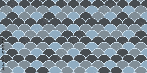 Abstract seamless pattern of overlapping semicircles in calming blue and gray tones.  Perfect for backgrounds, website designs, textile prints, and more.
