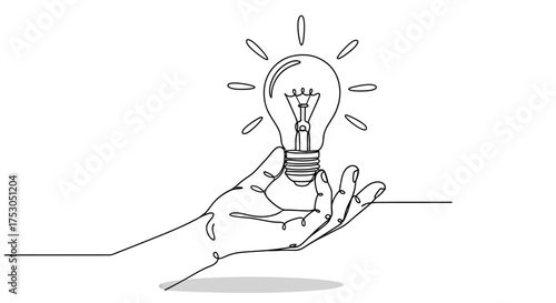 Hand holding a glowing light bulb, symbolizing a bright new idea or inspiration.