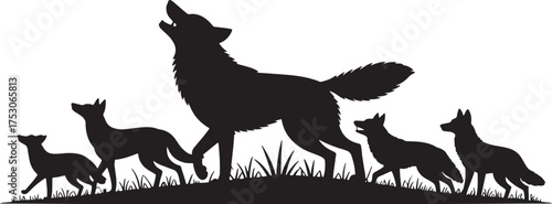 Black silhouette of a wolf howling with three smaller wolves in a grassy field black and white pack