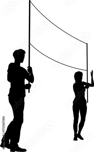 Two protestors or demonstrators at a demonstration march, picket line or strike protest rally in silhouette. Holding up a banner sign.