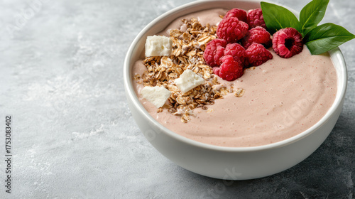Wallpaper Mural Creamy smoothie bowl topped with granola, raspberries, and fresh leaves, perfect for healthy Torontodigital.ca