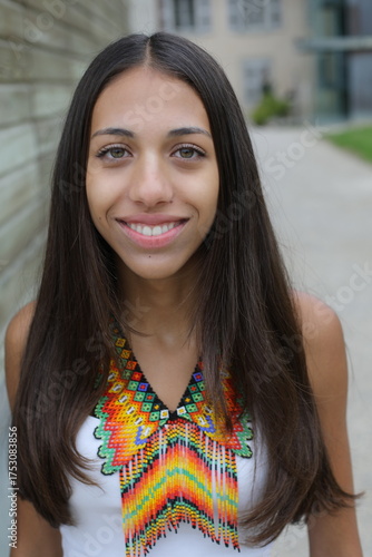 Native American girl with traditional colorful outfit 