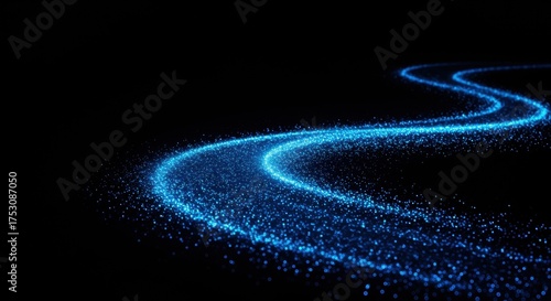 Abstract Blue Glowing Sparkle Trail Winding Through Darkness on Black Background