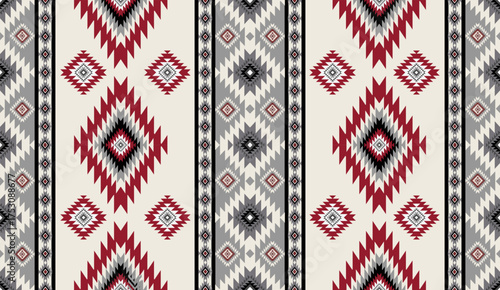 Seamless geometric ethnic pattern inspired by Native American tribal fabric. Traditional Aztec and Navajo style carpet and tile vector design on navy blue background. Perfect for textile, wrapping,