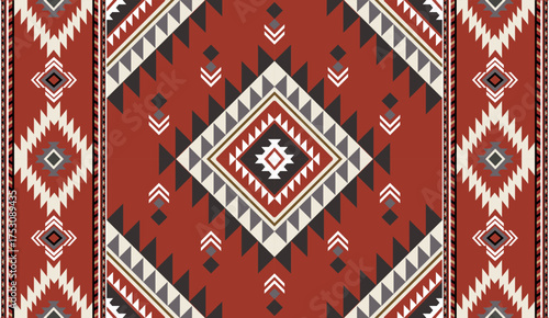 Seamless geometric ethnic pattern inspired by Native American tribal fabric. Traditional Aztec and Navajo style carpet and tile vector design on navy blue background. Perfect for textile, wrapping,