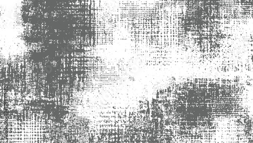 A textured abstract pattern with gray and white elements, resembling distressed fabric or a rough surface.
