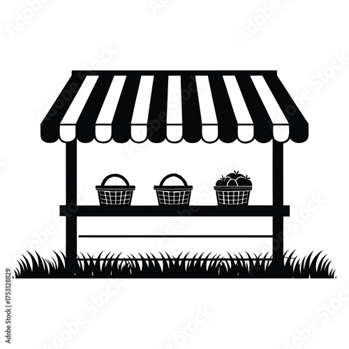 Simple black and white illustration of a rustic market stall with striped awning and three baskets of produce on a grassy field