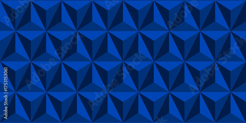 Geometric 3D pattern with blue diamond shapes creating a modern abstract background.