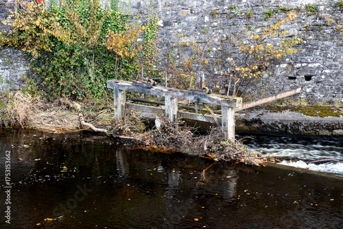 Old Wooden Sluice Remains Situated at the Allan Water Weir at Bridge of Allan in Stirlingshire Scotland
