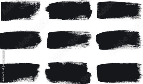 Collection of nine textured black paint brush stroke elements on a white background perfect for graphic design and artistic applications